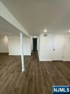 a view of a big room with wooden floor