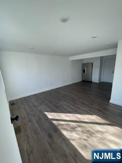 73 MacArthur Avenue, Unit 1 Lodi, NJ 07644 - Photo 4 of 15 a view of a room with wooden floor