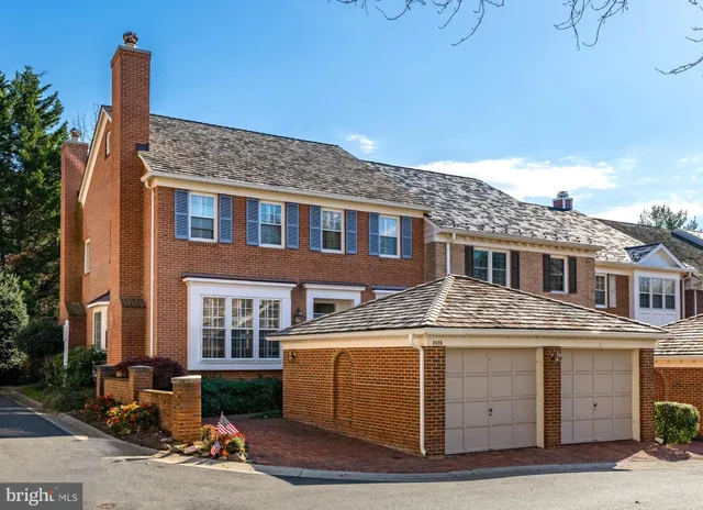 a front view of a building with many windows