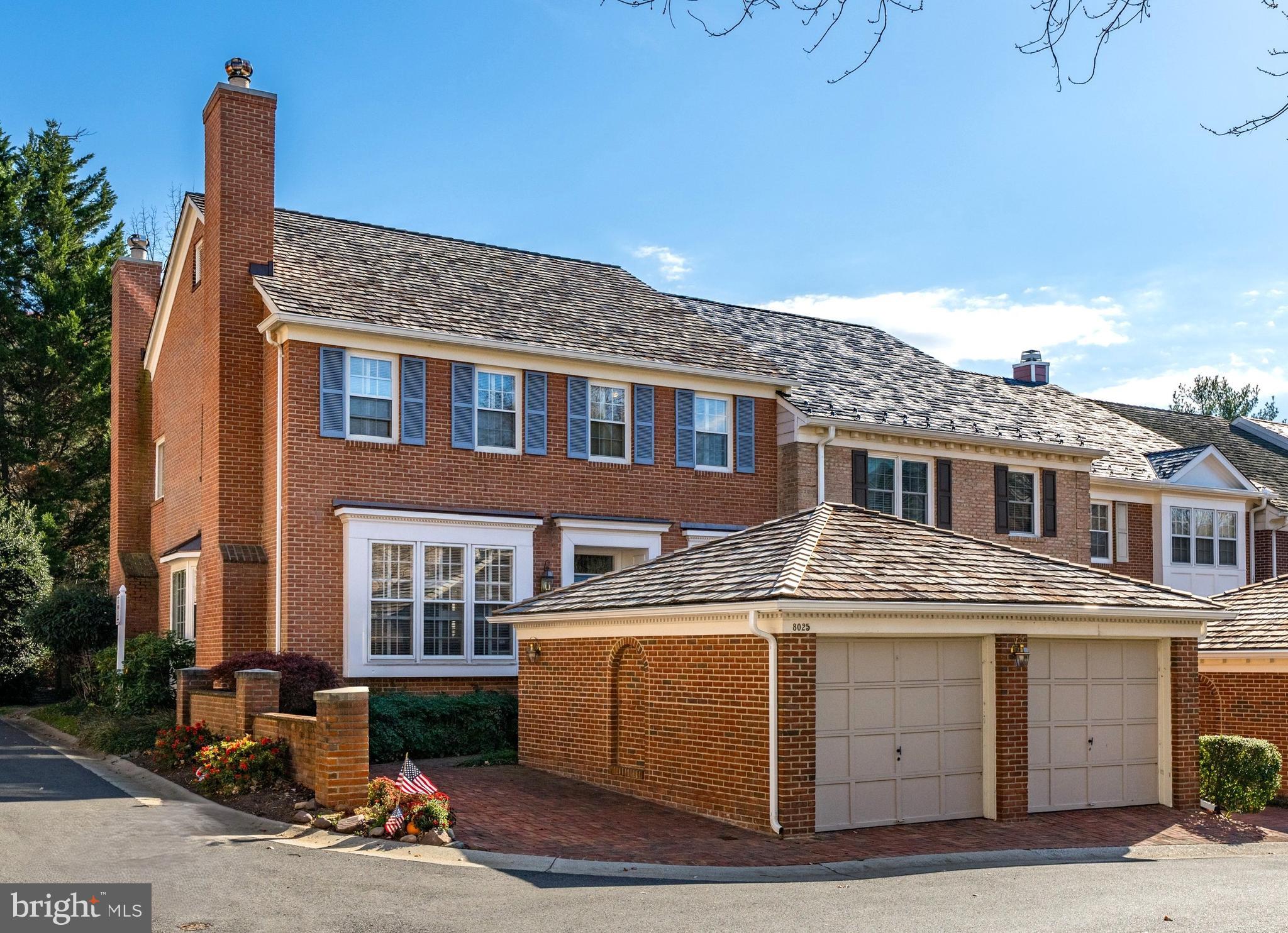 a front view of a building with many windows