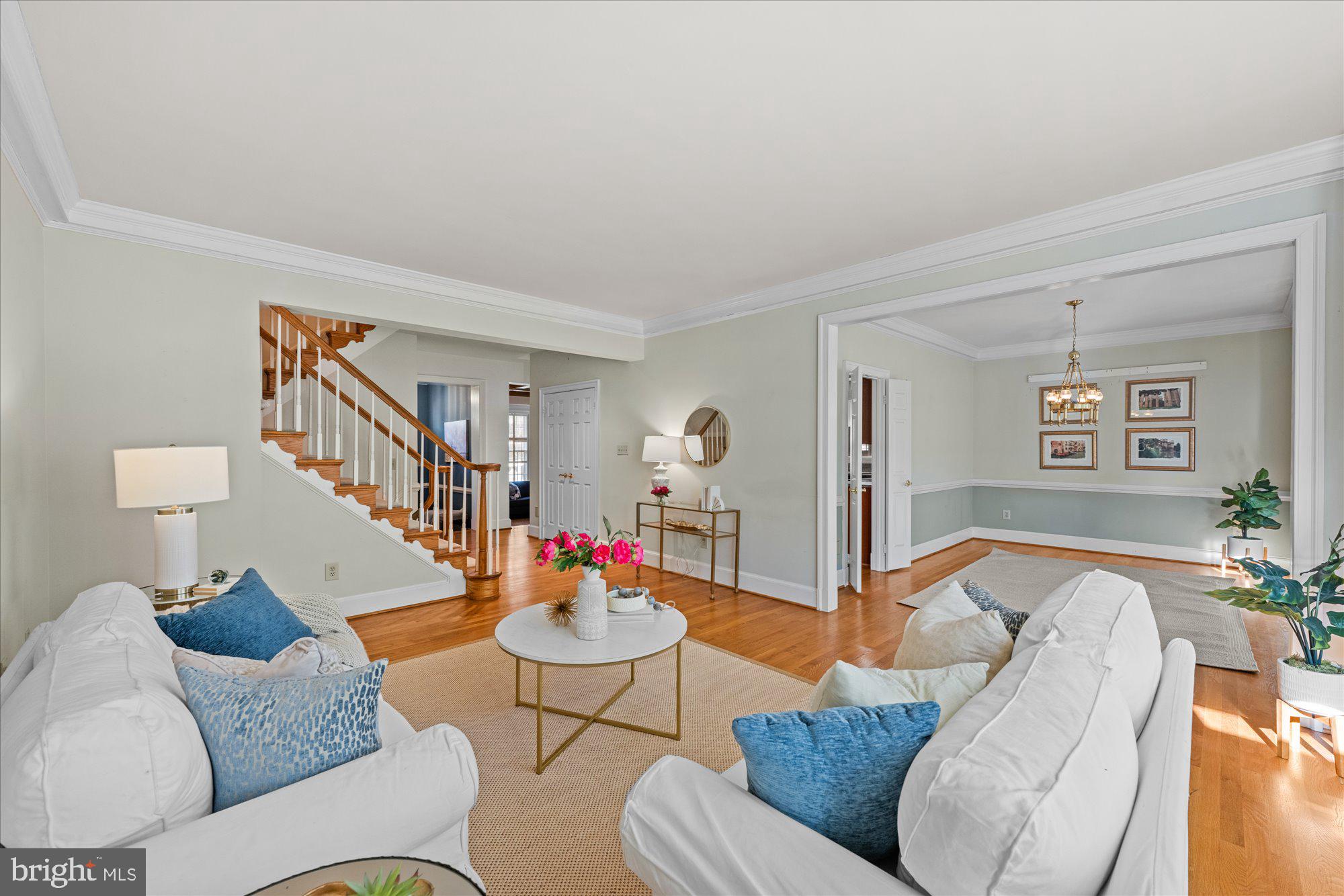 8025 Rising Ridge Road Bethesda, MD 20817 - Photo 13 of 34 a living room with furniture and a wooden floor