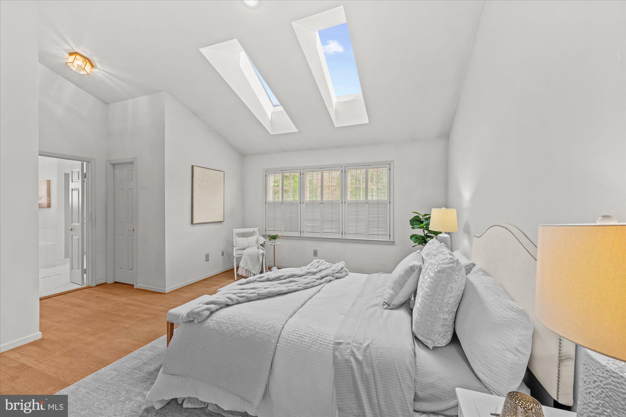 8025 Rising Ridge Road Bethesda, MD 20817 - Photo 17 of 34 a bedroom with a bed and window