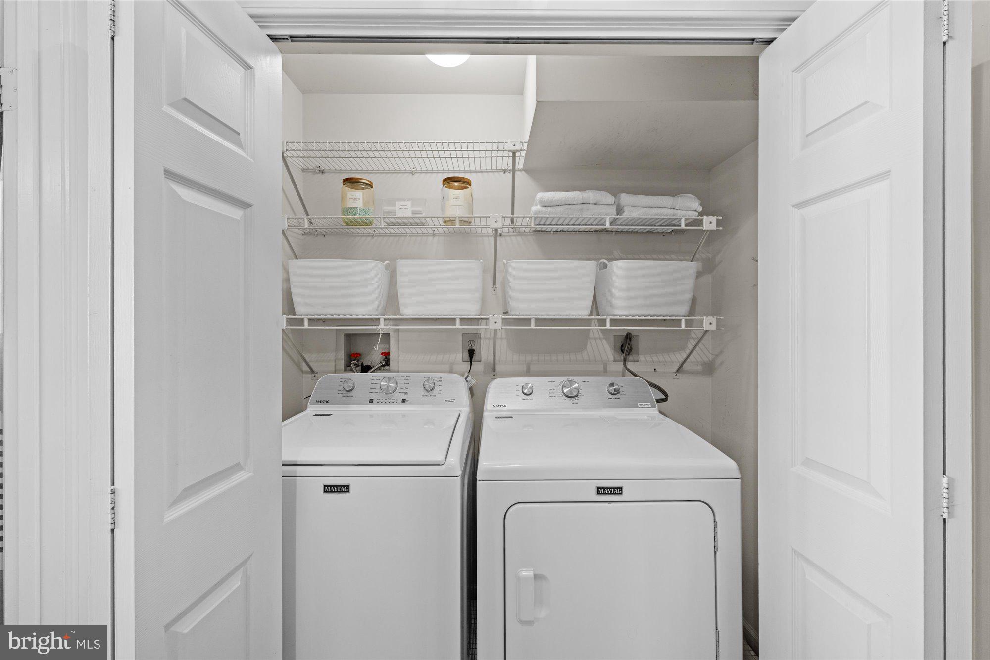 8025 Rising Ridge Road Bethesda, MD 20817 - Photo 23 of 34 a utility room with dryer and washer