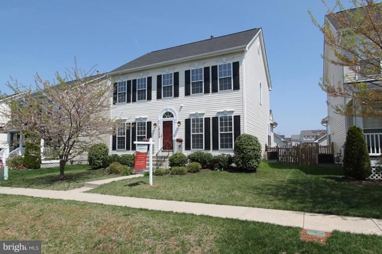 18409 Cornflower Road Boyds, MD 20841 - Photo 1 of 24 a front view of a house with a yard