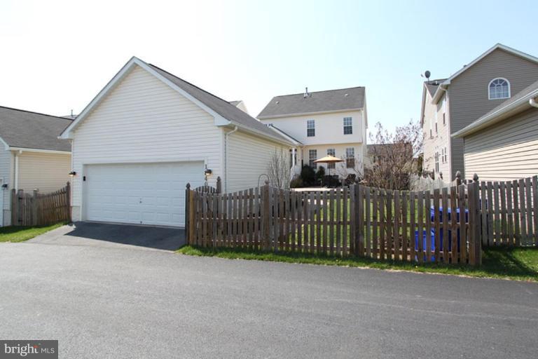 18409 Cornflower Road Boyds, MD 20841 - Photo 16 of 24 a view of a house with wooden fence