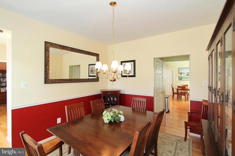 18409 Cornflower Road Boyds, MD 20841 - Photo 20 of 24 a view of a dining room with furniture