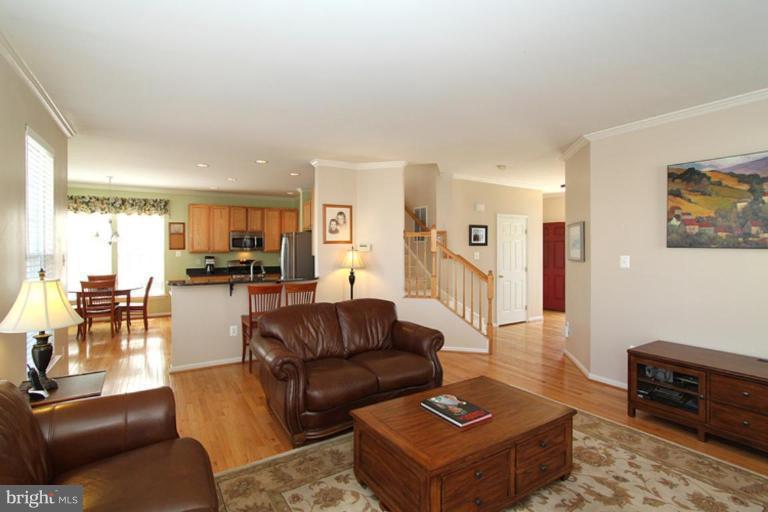 18409 Cornflower Road Boyds, MD 20841 - Photo 3 of 24 a living room with furniture kitchen view and a window