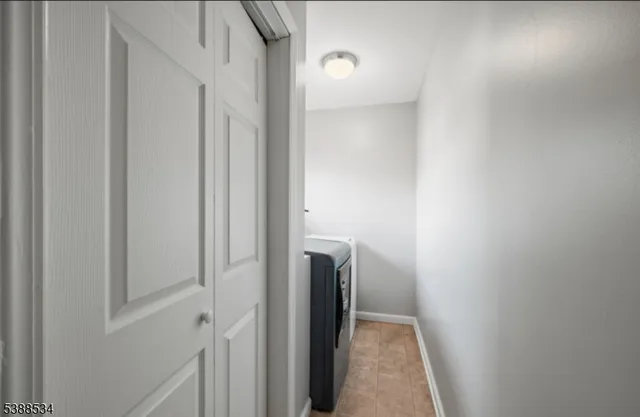 a view of hallway with closet