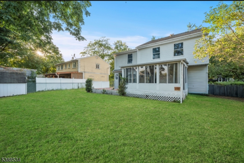 136 Haroldson Place Pompton Lakes, NJ 07442 - Photo 4 of 23 a view of a house with backyard and a garden
