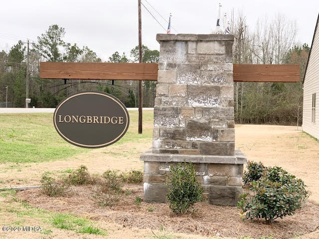 203 Longbridge Way Perry, GA 31069 - Photo 5 of 31 a sign that is sitting on the side of a building