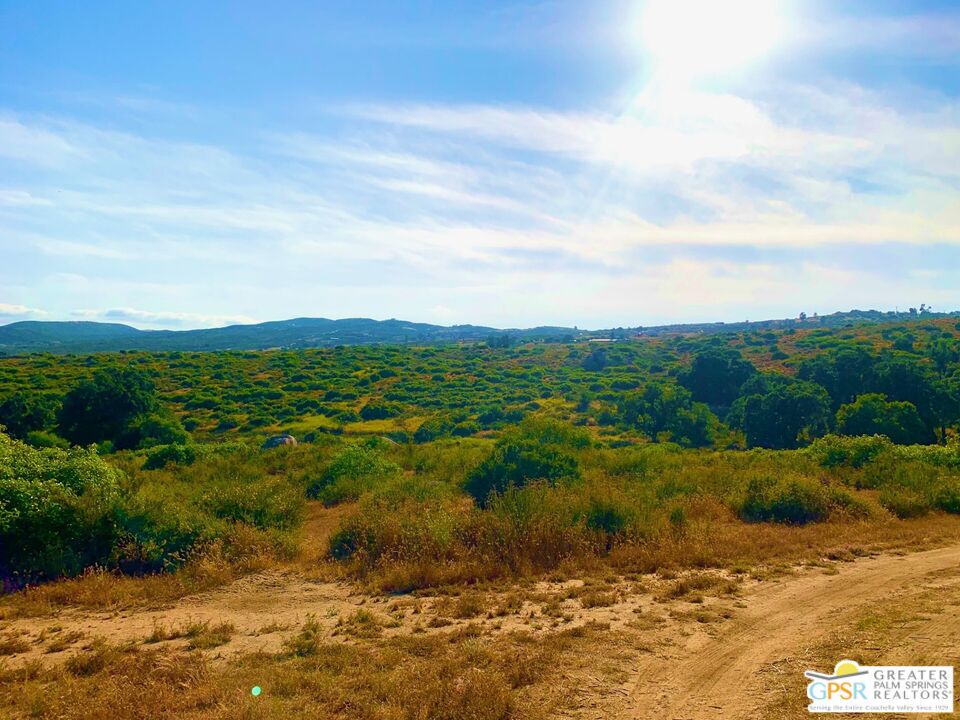 0 Serriano Road Hemet, CA 92544 - Photo 6 of 8 a view of a lake with mountains in the background