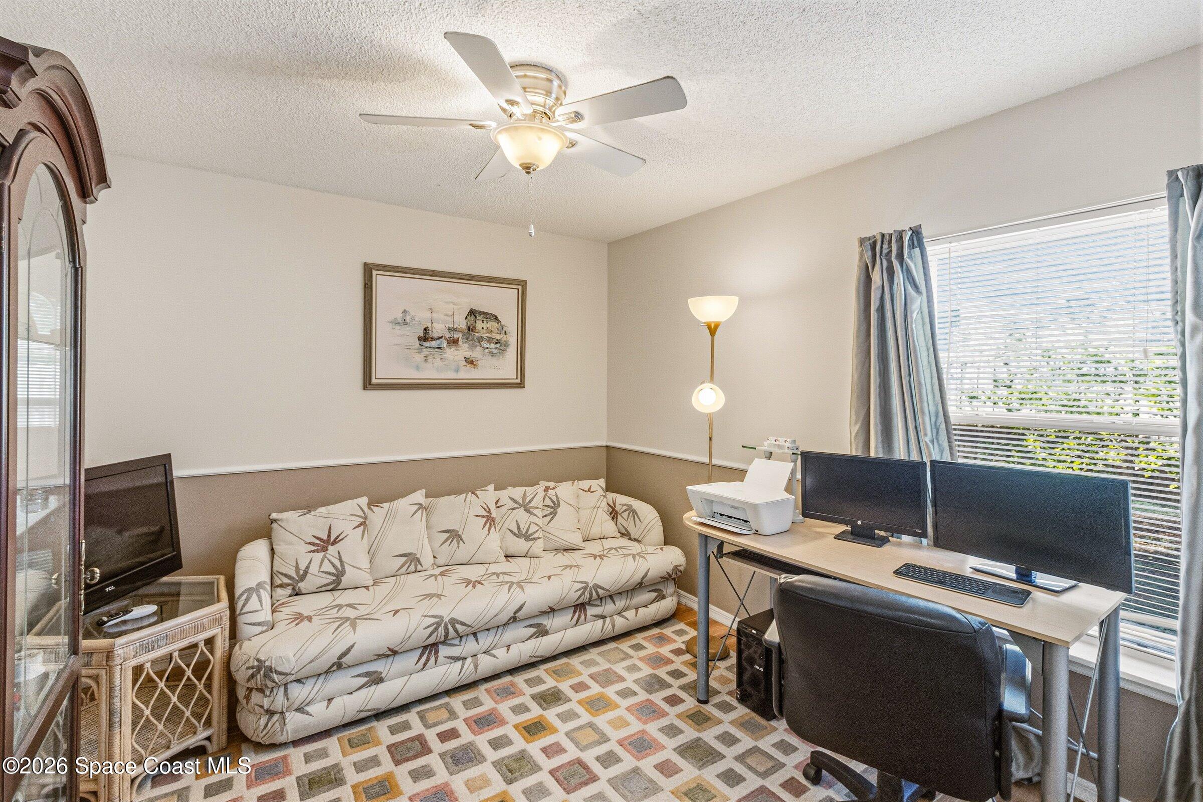 4770 Hidden Creek Road Palm Shores, FL 32935 - Photo 29 of 51 a bed room with a bed and a window
