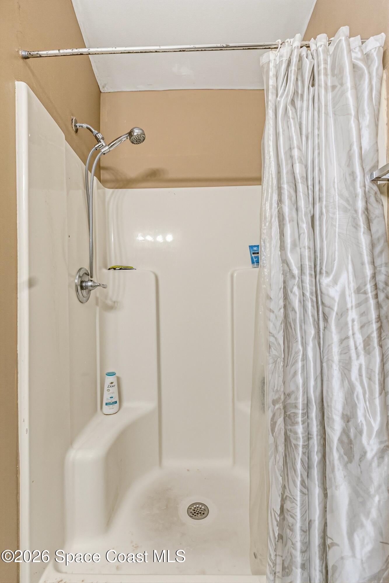 4770 Hidden Creek Road Palm Shores, FL 32935 - Photo 38 of 51 a bathroom with a shower