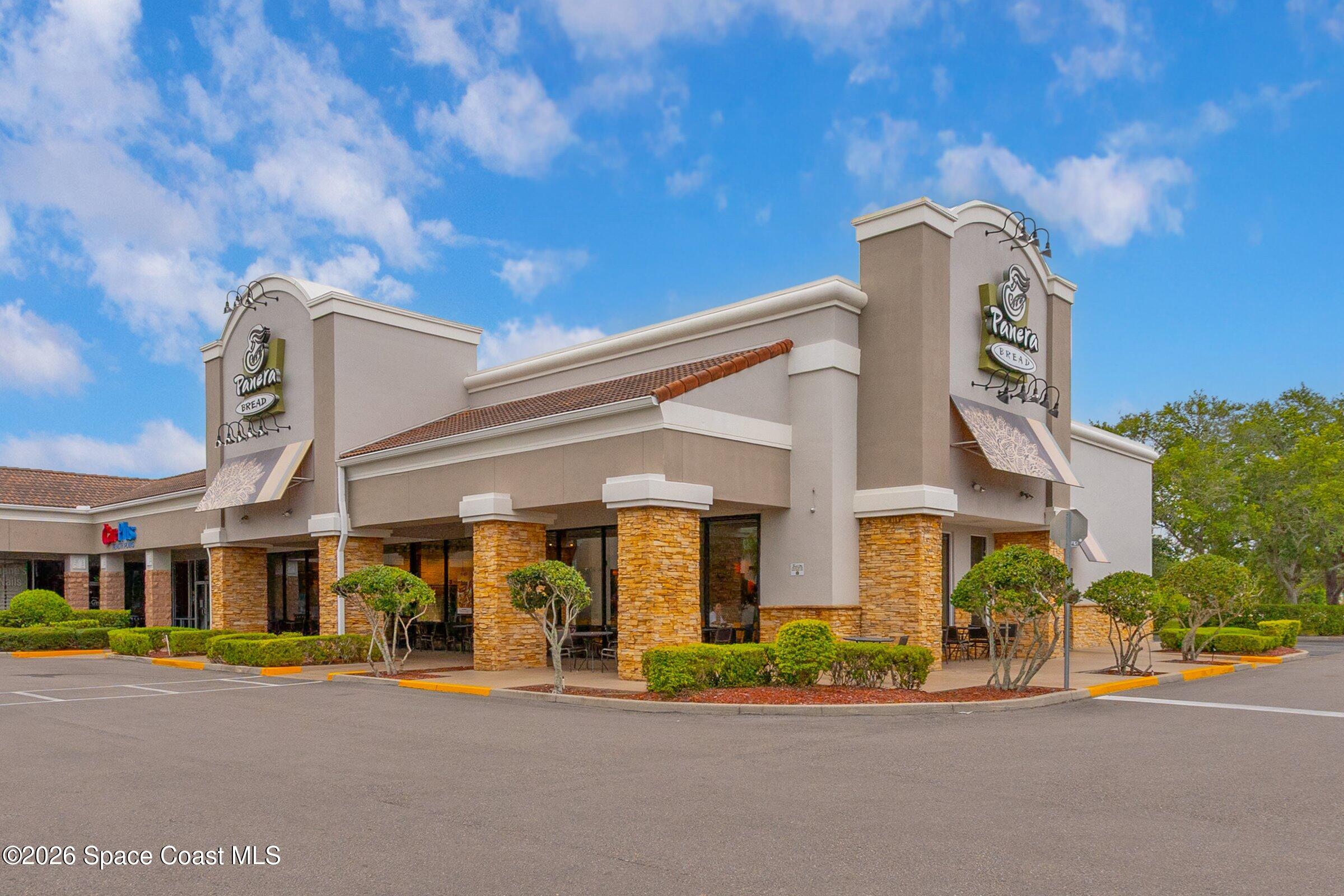 4770 Hidden Creek Road Palm Shores, FL 32935 - Photo 44 of 51 a front view of a building with street view