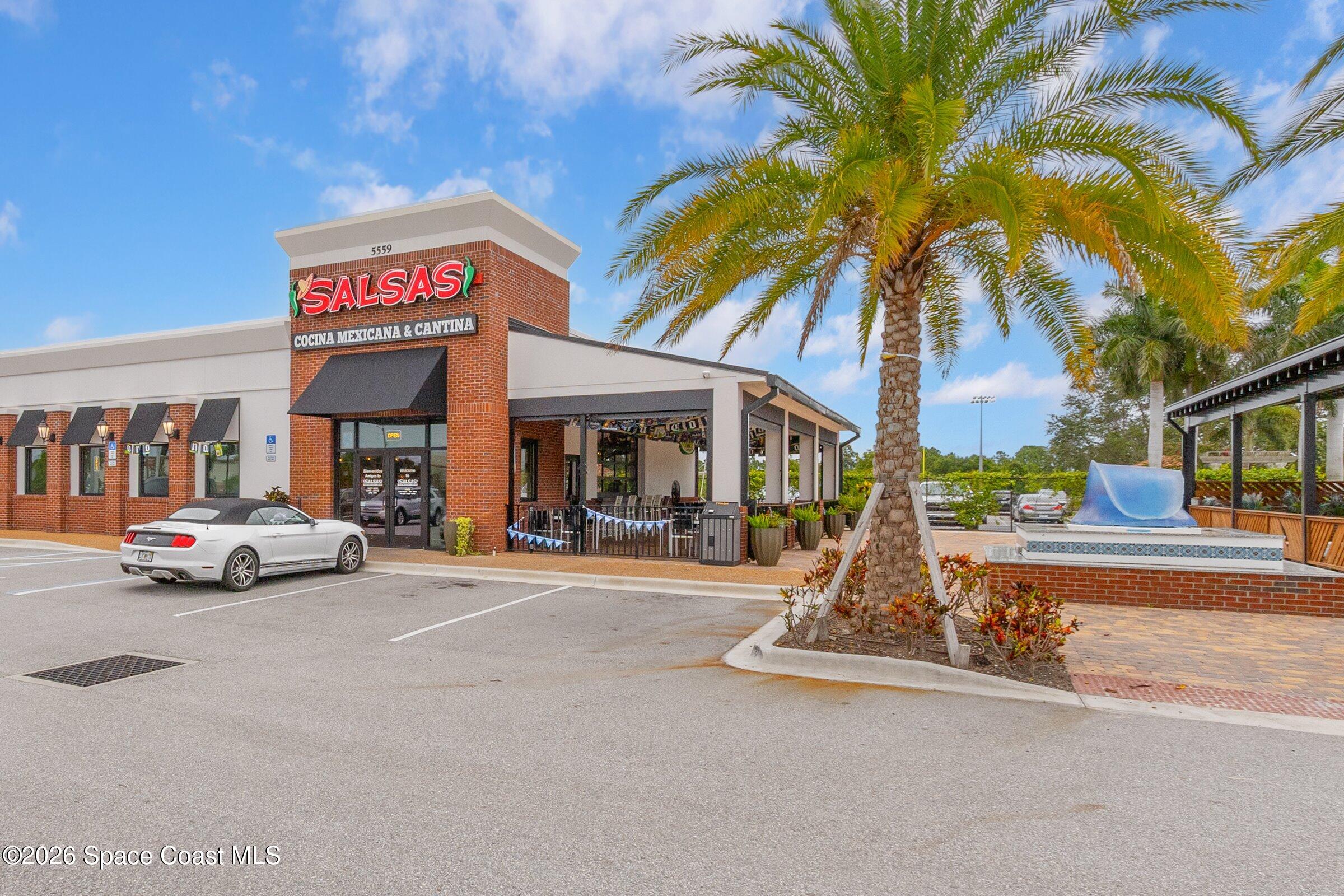 4770 Hidden Creek Road Palm Shores, FL 32935 - Photo 51 of 51 a view of a street with cars on the road