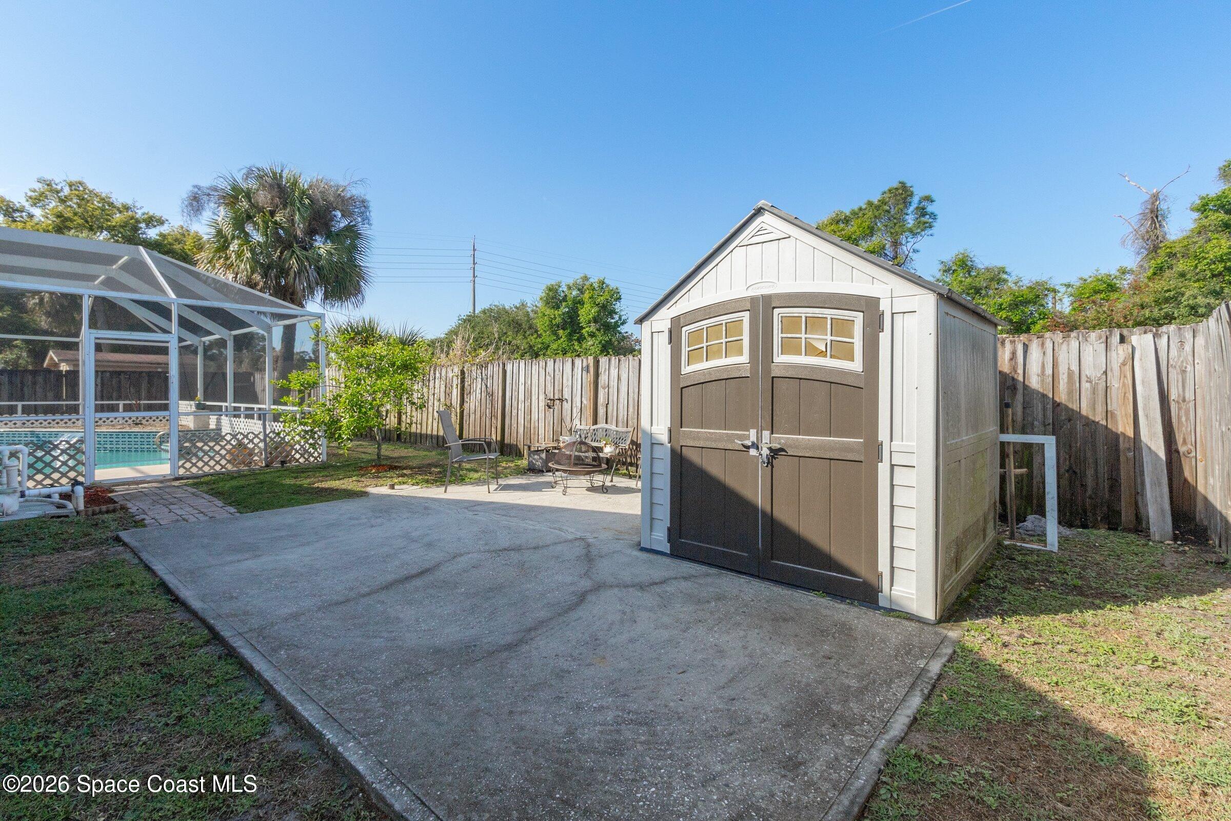 4770 Hidden Creek Road Palm Shores, FL 32935 - Photo 7 of 51 a view of a back yard of the house