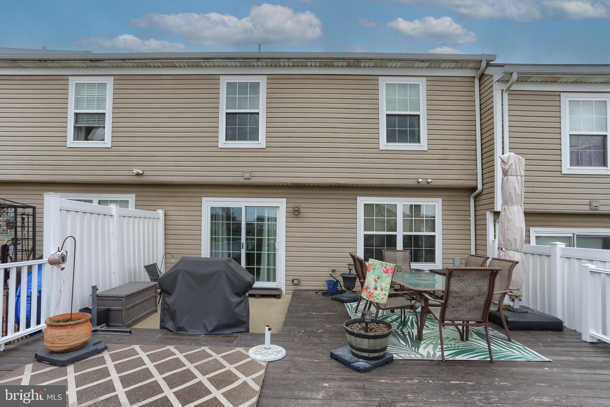 509 Fox Ridge Lane Lebanon, PA 17042 - Photo 34 of 39 Deck area rugs and flower pots convey w/ the home