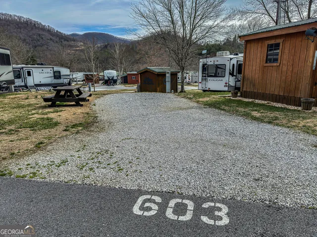 a view of a car parked in front of house