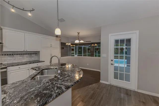 a view of a house with a swimming pool