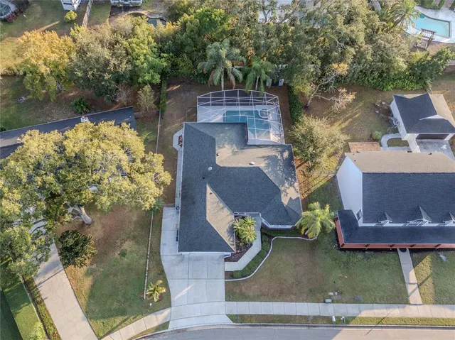 a backyard of a house with lots of green space