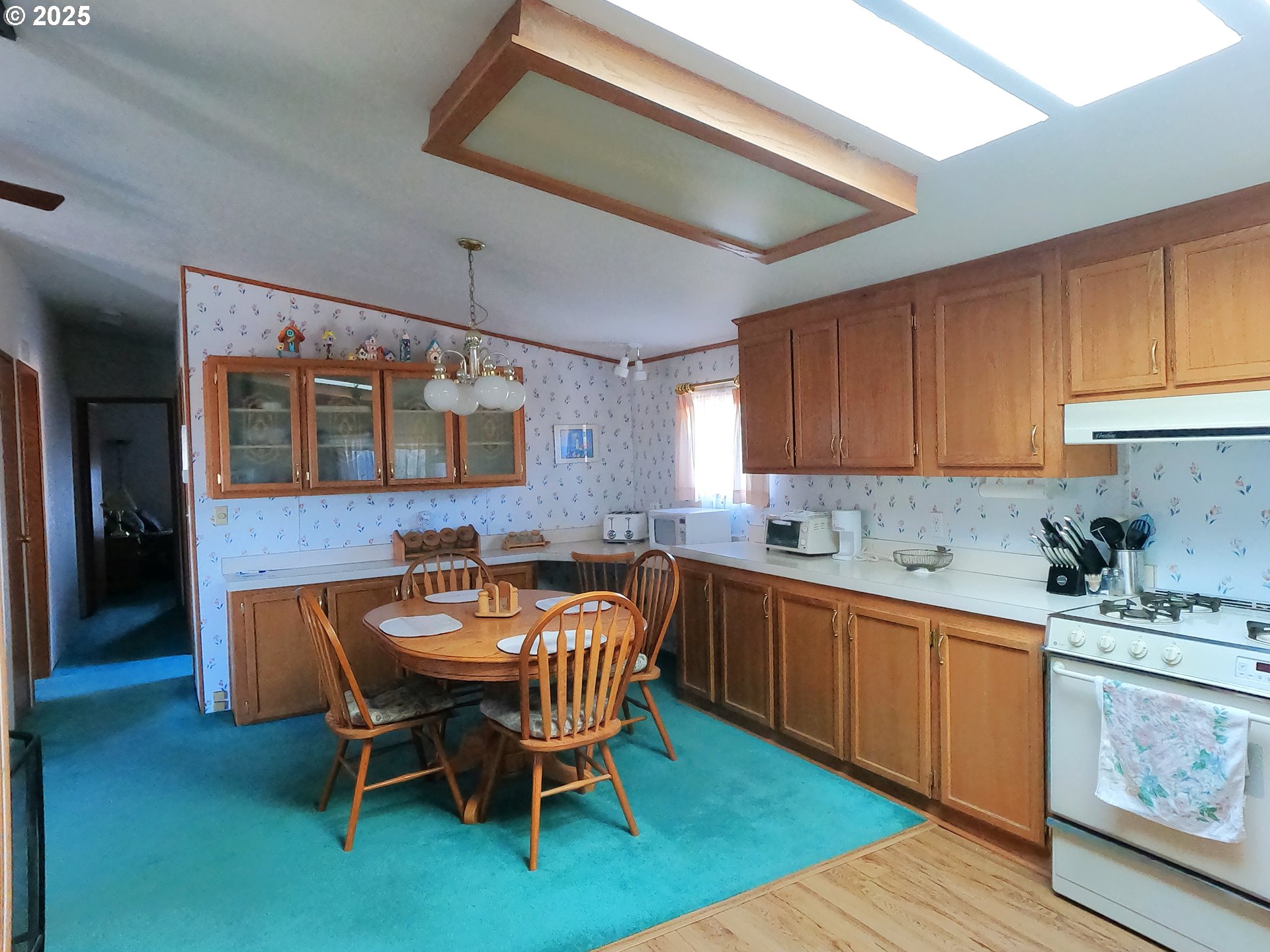 12705 Southwest Airfield Lane Culver, OR 97734 - Photo 12 of 20 a kitchen with granite countertop a sink and cabinets