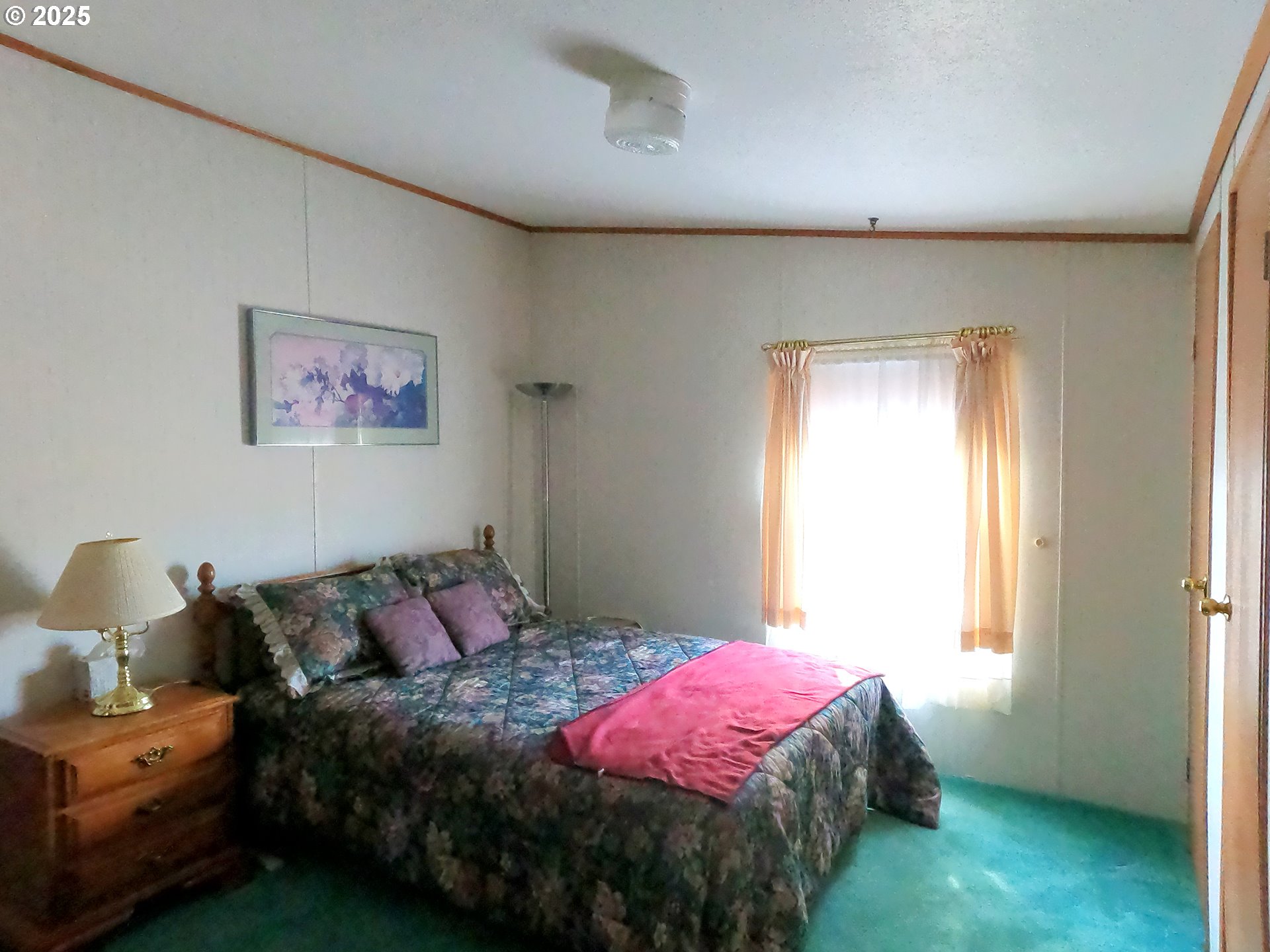 12705 Southwest Airfield Lane Culver, OR 97734 - Photo 18 of 20 a bedroom with a bed and a window