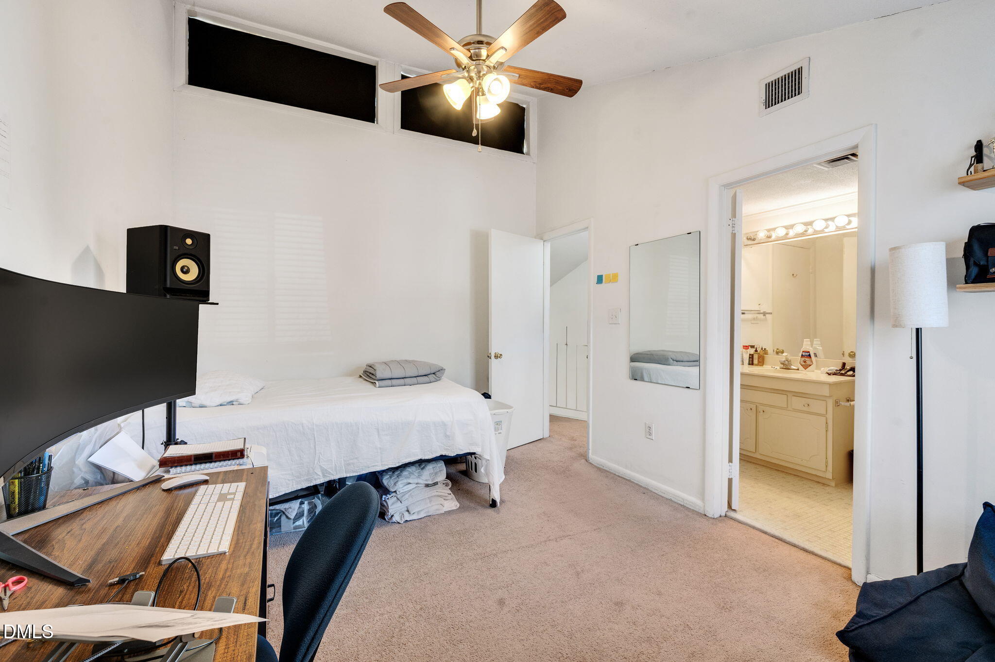 4603 Edwards Mill Road Raleigh, NC 27612 - Photo 16 of 26 a view of a workspace with furniture and bathroom view