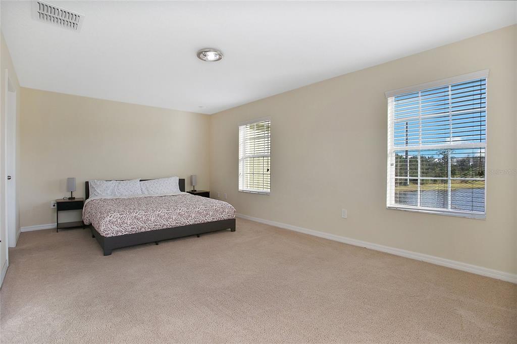 3216 Rodrick Circle Orlando, FL 32824 - Photo 11 of 33 a bedroom with a bed and a window