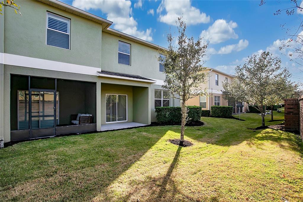 3216 Rodrick Circle Orlando, FL 32824 - Photo 20 of 33 a view of a house with a yard and tree s