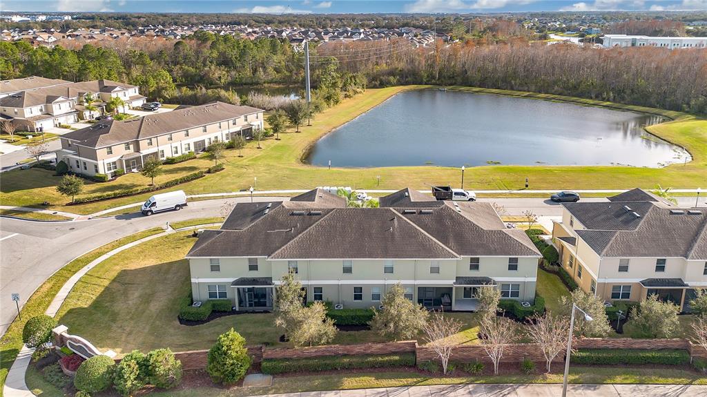 3216 Rodrick Circle Orlando, FL 32824 - Photo 27 of 33 an aerial view of residential houses with outdoor space and swimming pool