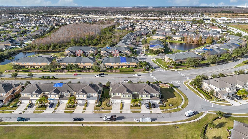 3216 Rodrick Circle Orlando, FL 32824 - Photo 29 of 33 an aerial view of residential houses with outdoor space