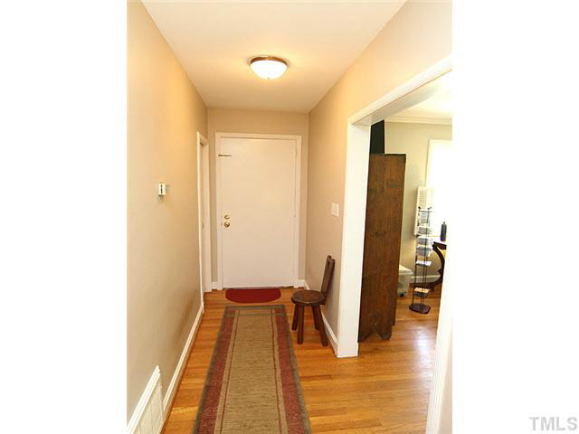 1724 Nottingham Road Raleigh, NC 27607 - Photo 3 of 25 Hardwood floors extend to living room and dining room.