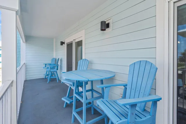 a view of a room with a table and chair