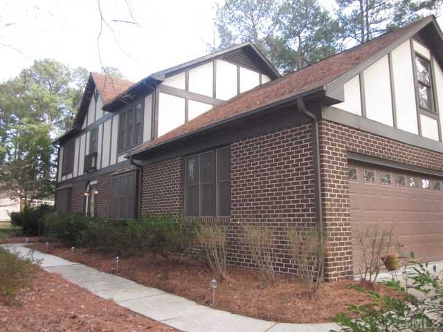 6708 Colony Court Raleigh, NC 27613 - Photo 3 of 25 Wonderful view of the front with sidewalk leading from driveway and two car garage! Some updates include new paint first floor 2012, stairwell & hallway! HVAC updated 11-2009! Exterior Front