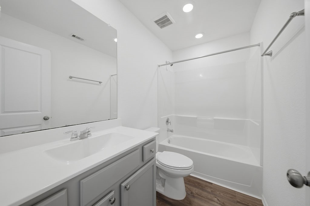 14230 Overbrook Willow Way Rosharon, TX 77583 - Photo 32 of 50 a bathroom with a sink a toilet and shower