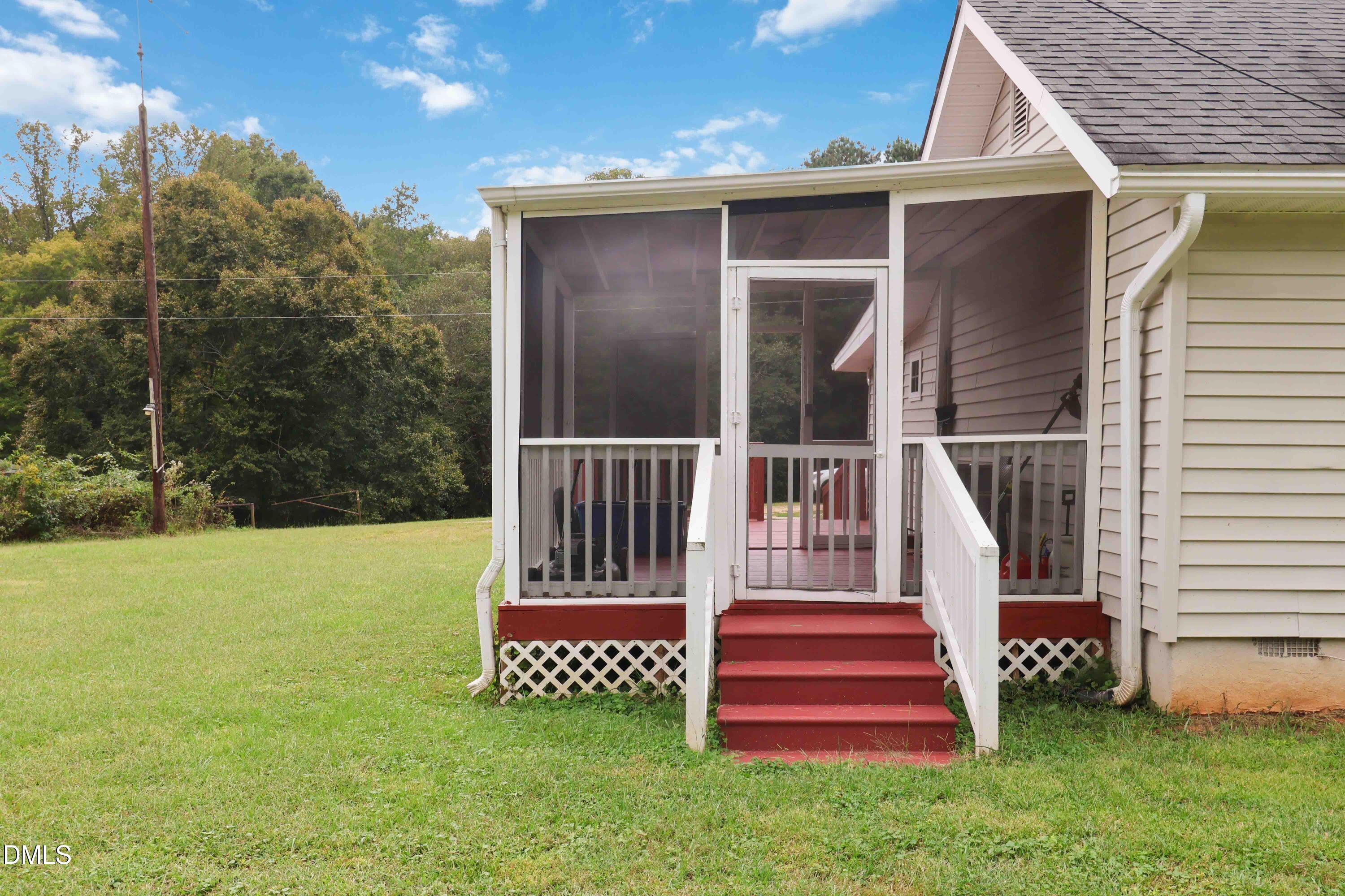 5209 Durham Road Raleigh, NC 27613 - Photo 16 of 18 a view of outdoor space and deck