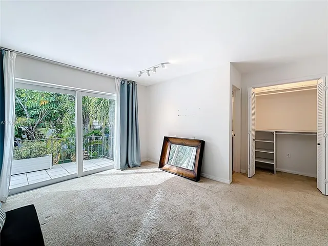 a view of a room with large window