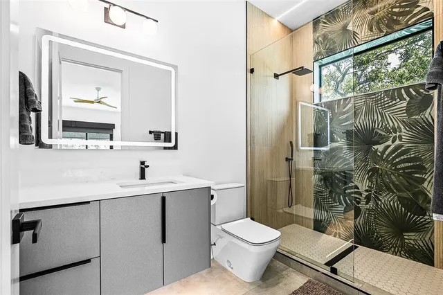 a view of swimming pool with chairs