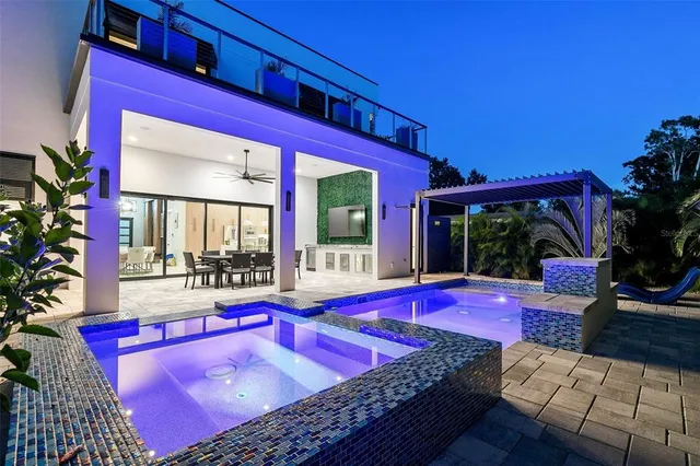 an aerial view of a house with a garden