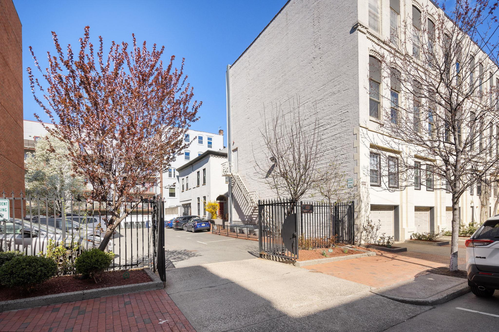 222 Clinton Street, Unit 13 Hoboken, NJ 07030 - Photo 12 of 16 a city street lined with buildings and trees