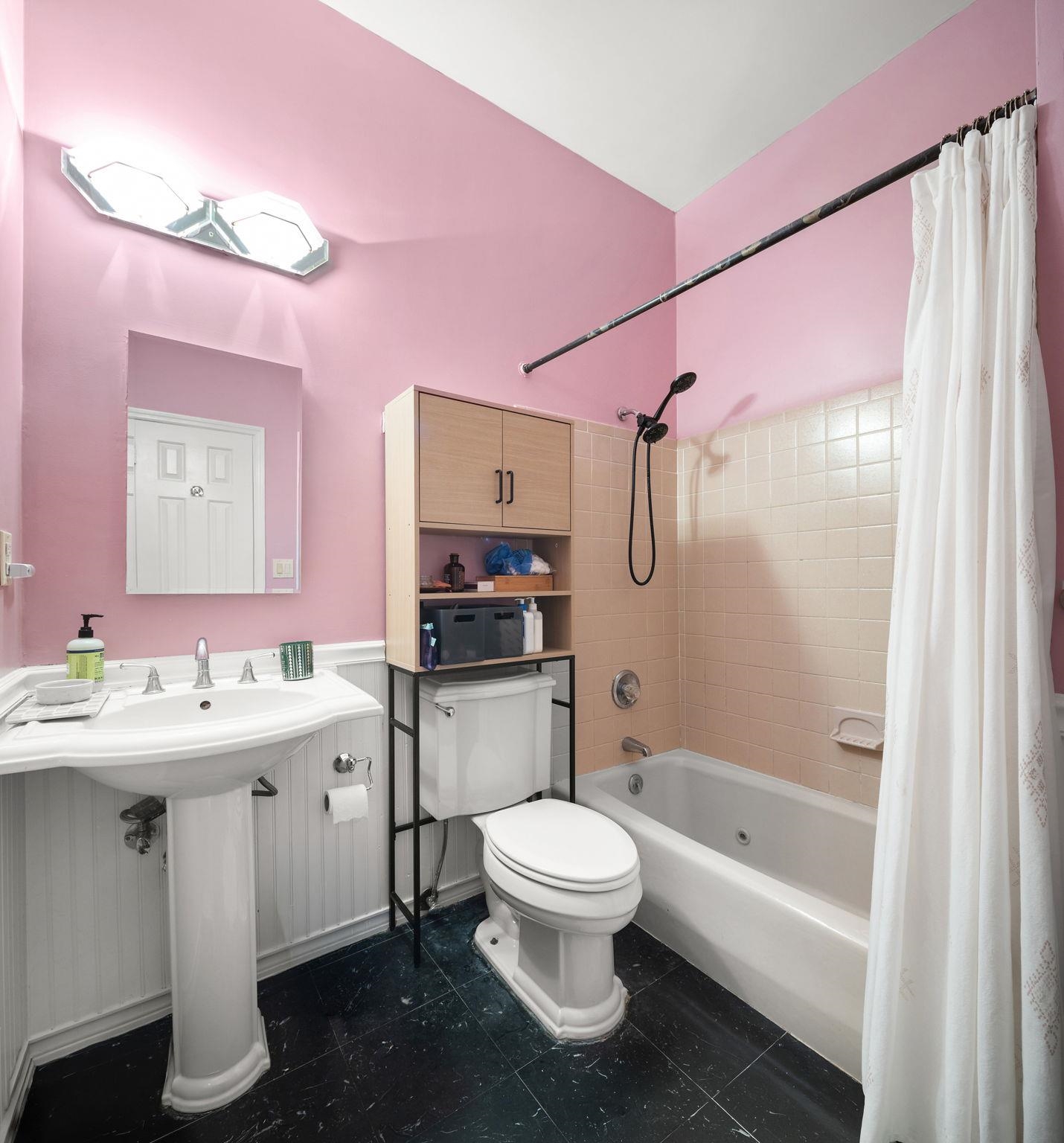 222 Clinton Street, Unit 13 Hoboken, NJ 07030 - Photo 7 of 16 a bathroom with a sink toilet tub and shower