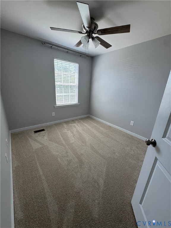 1944 Kennington Park Road Aylett, VA 23009 - Photo 19 of 24 Bedroom featuring light gray wall paint, neutral-t