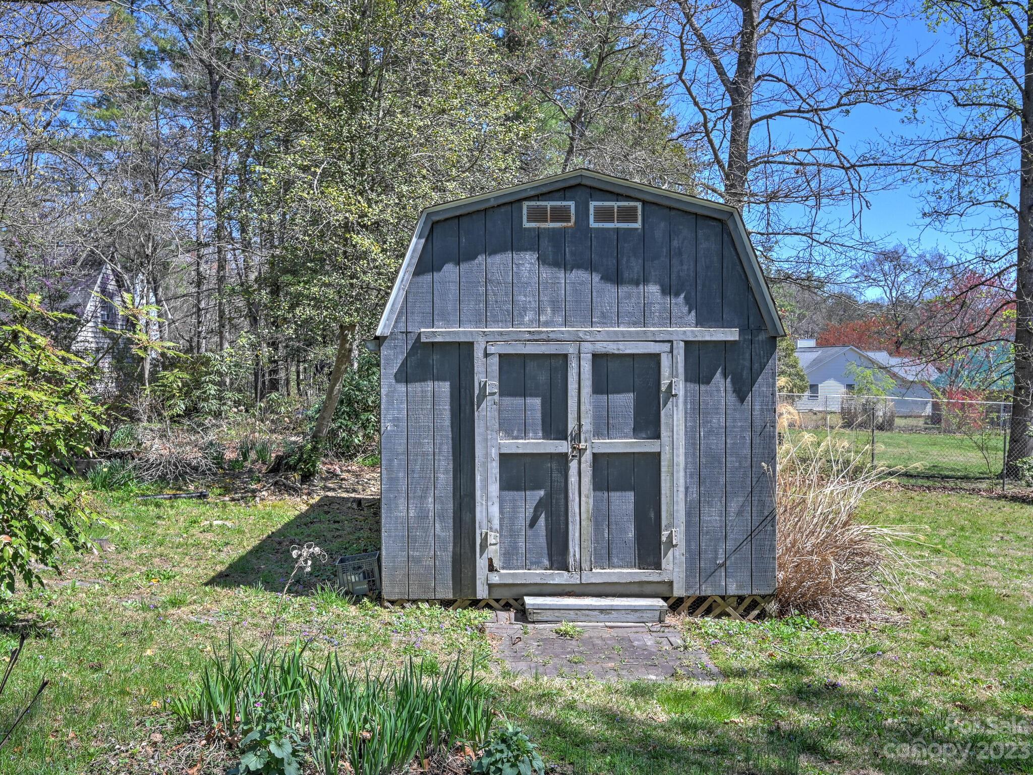 15 Maple Road Arden, NC 28704 - Photo 31 of 33 a front view of a house with garden