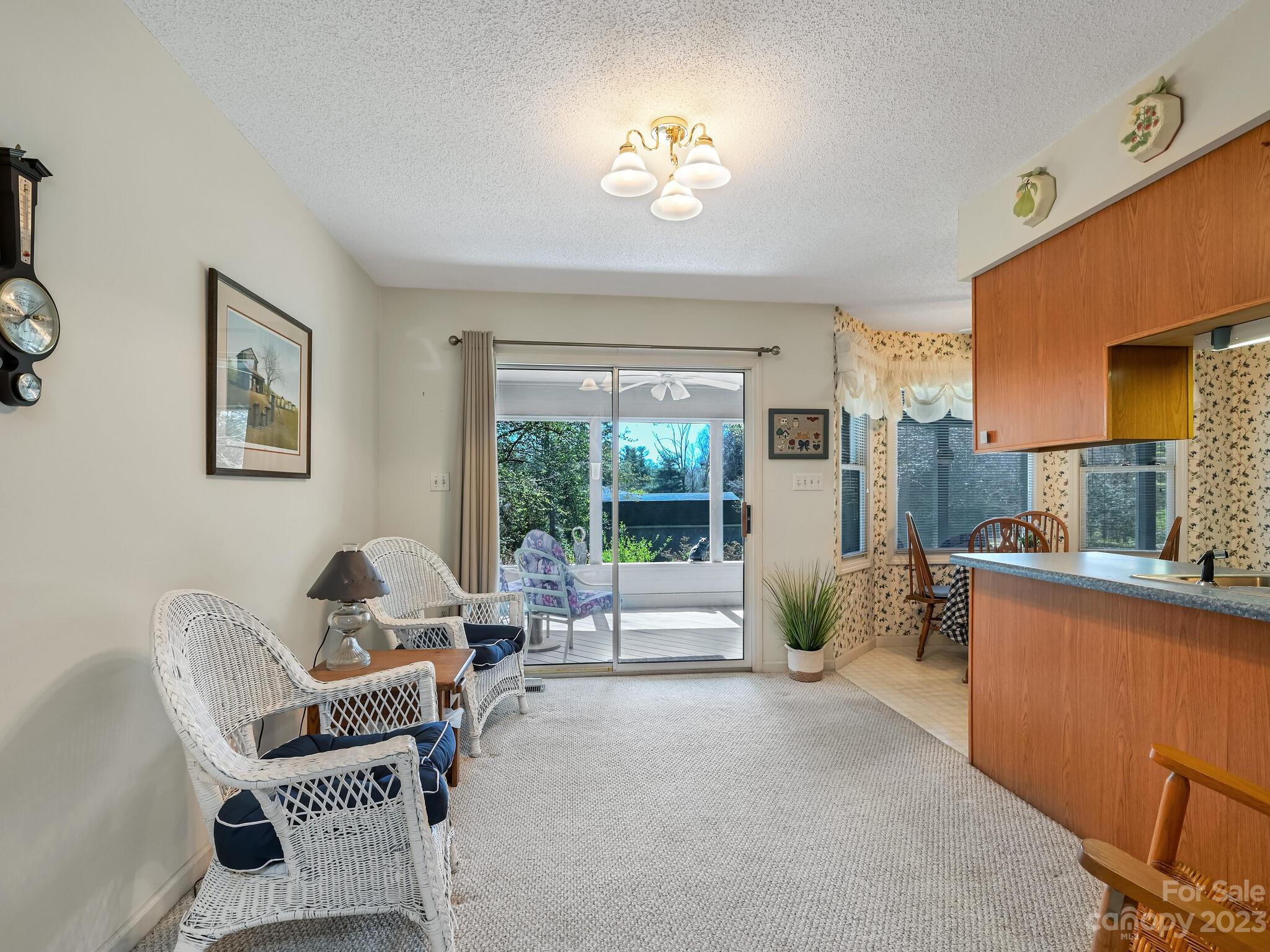 15 Maple Road Arden, NC 28704 - Photo 7 of 33 a living room with furniture and a large window