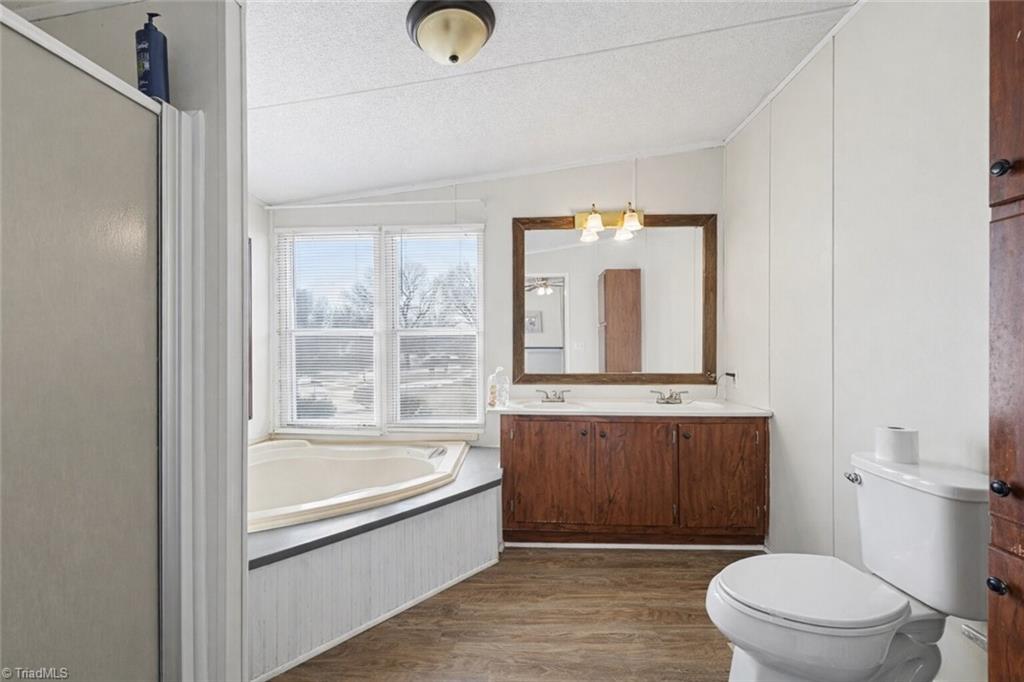1160 Sandy Cross Road Reidsville, NC 27320 - Photo 13 of 22 Primary Bathroom Virtually Staged removing personal Items