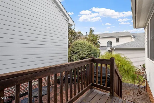a view of balcony with furniture