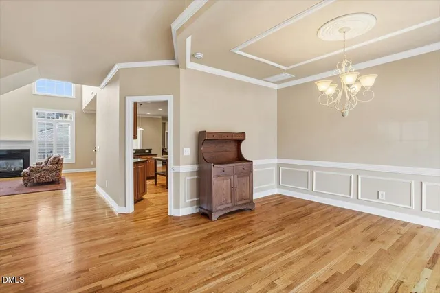 a room with furniture and wooden floor