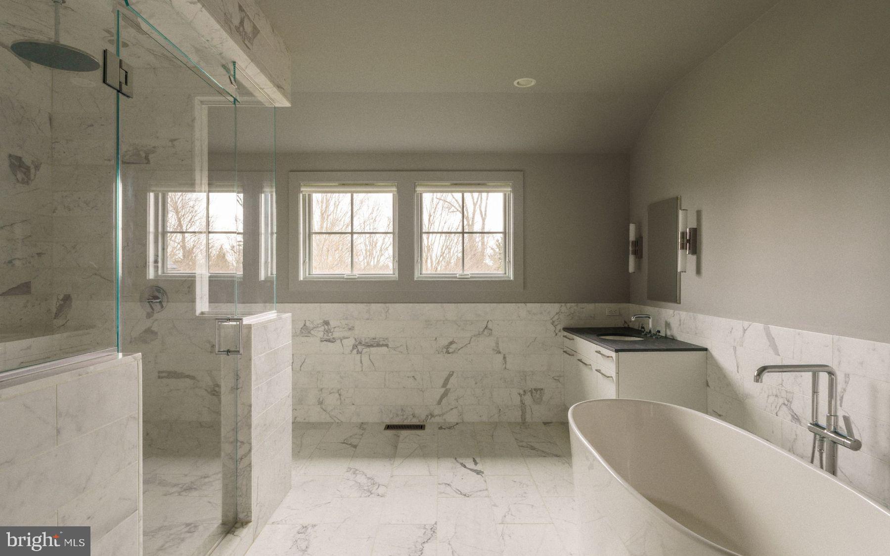 609 St Andrews Road Philadelphia, PA 19118 - Photo 22 of 43 a bathroom with a bathtub and shower