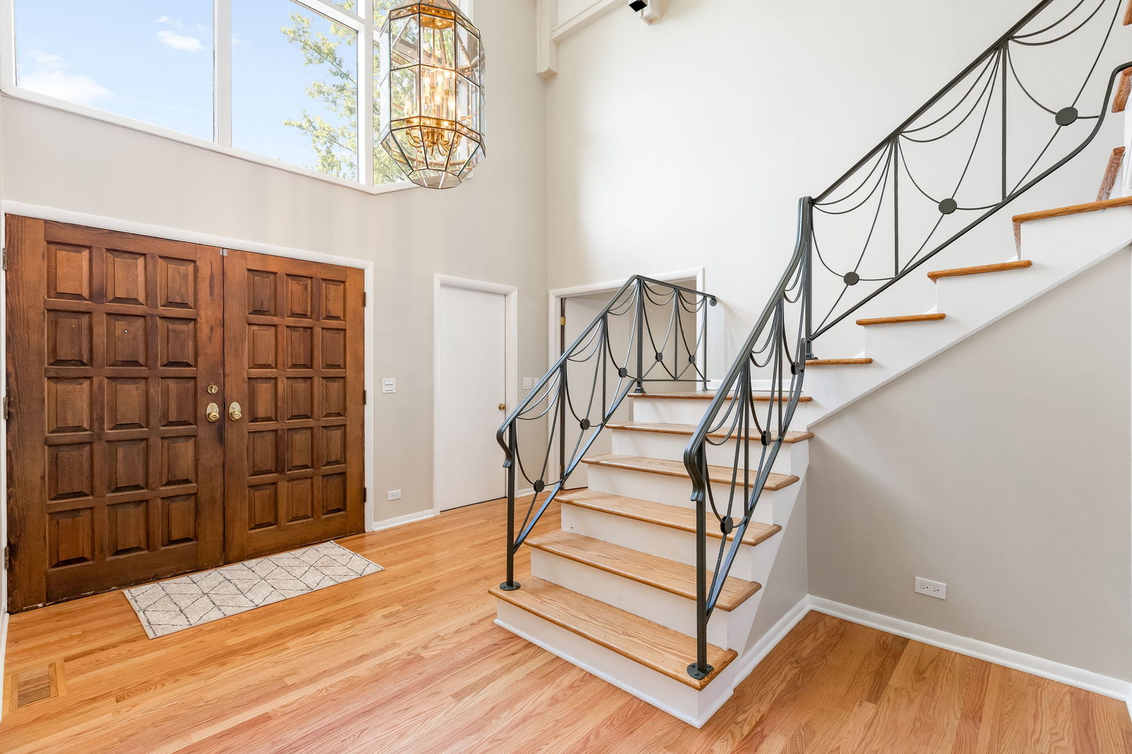 3528 Riverside Drive Wilmette, IL 60091 - Photo 12 of 33 a view of entryway with stairs and wooden floor