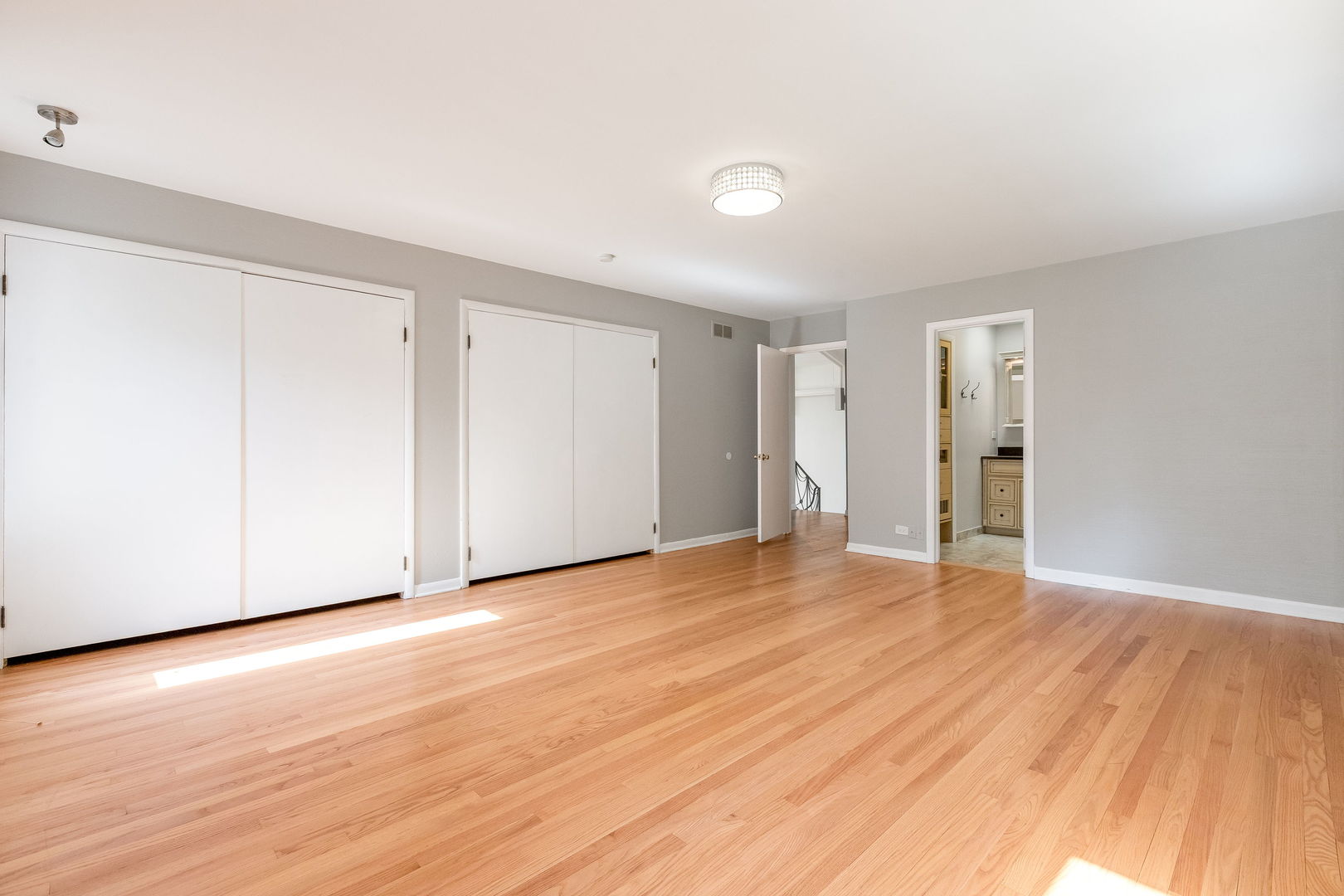 3528 Riverside Drive Wilmette, IL 60091 - Photo 13 of 33 a view of an empty room with wooden floor